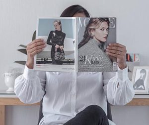 In a story about the power of print ad sales a woman reading a magazine
